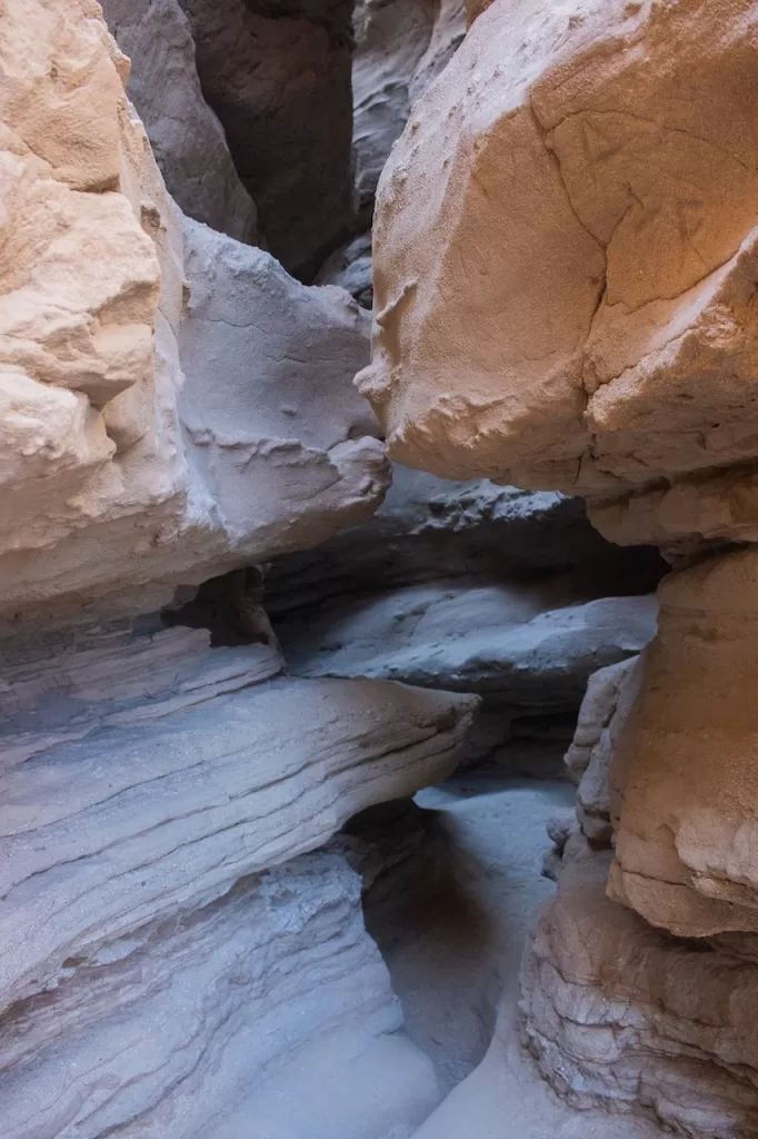 walking through a slot canyon in Anza-Borrego Desert State Park.