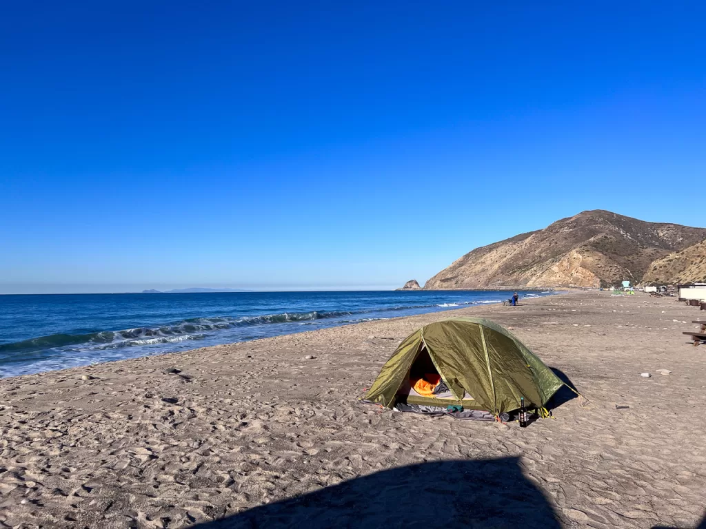 A tent set up on the beach during a Point Mugu State Park camping trip. 