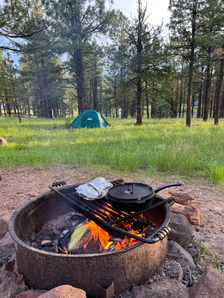 Cooking over an open campfire and camping at Apache-Sitgreaves National Forest.