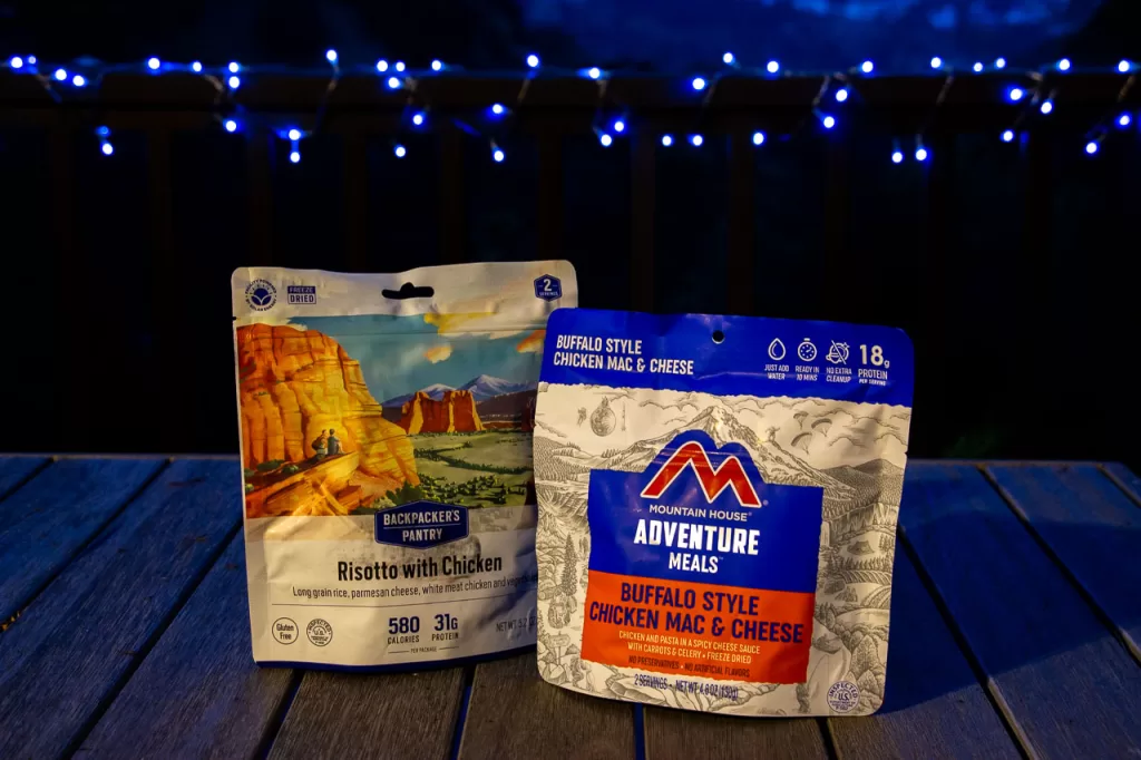 A Backpacker's Pantry Risotto with Chicken meal and a Mountain House Buffalo Style Chicken Mac & Cheese meal. 