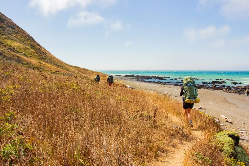 Hikers traversing the Lost Coast Trail.