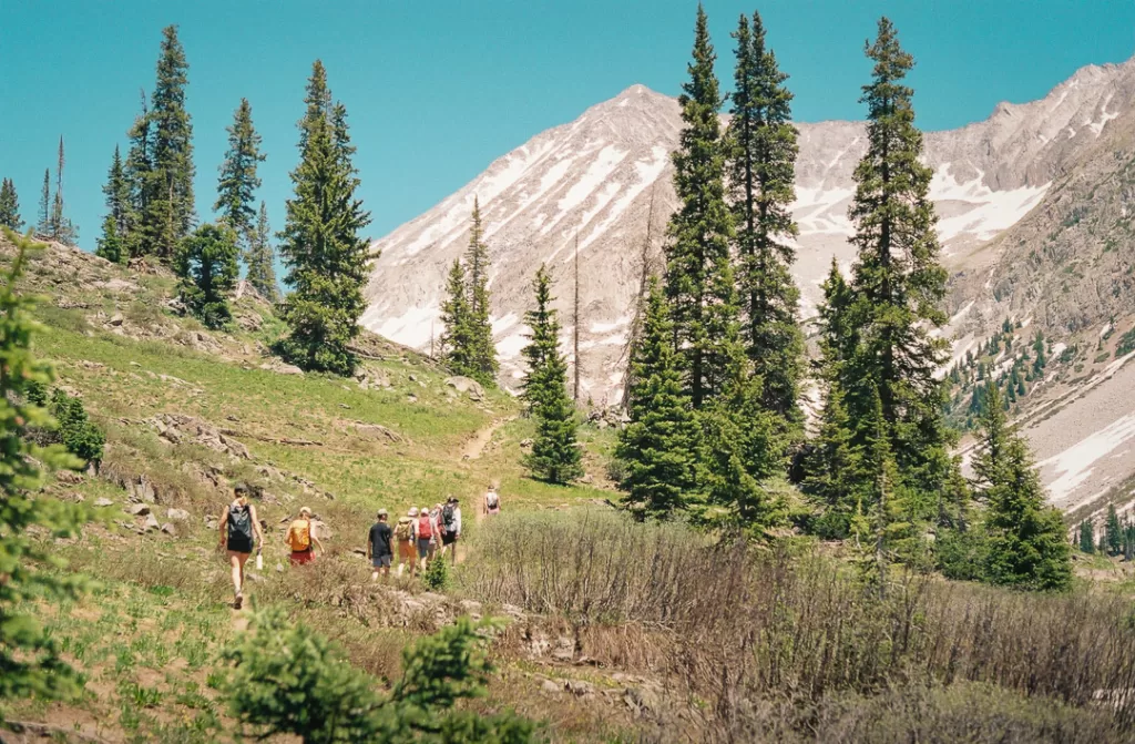 Hikers hiking through the Colorado Mountains.