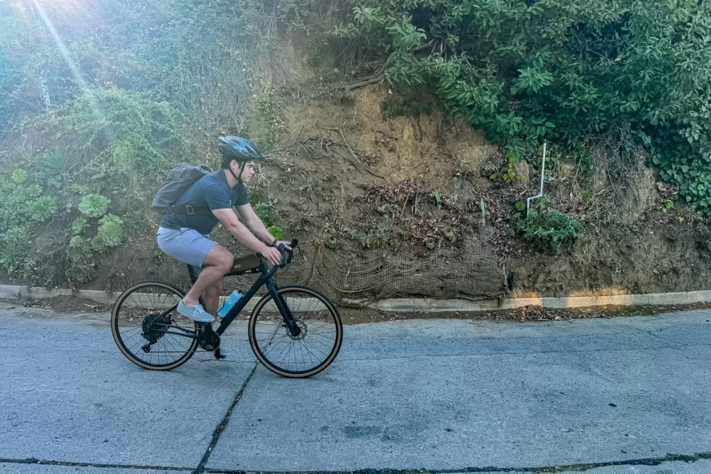 A biker riding on the road.