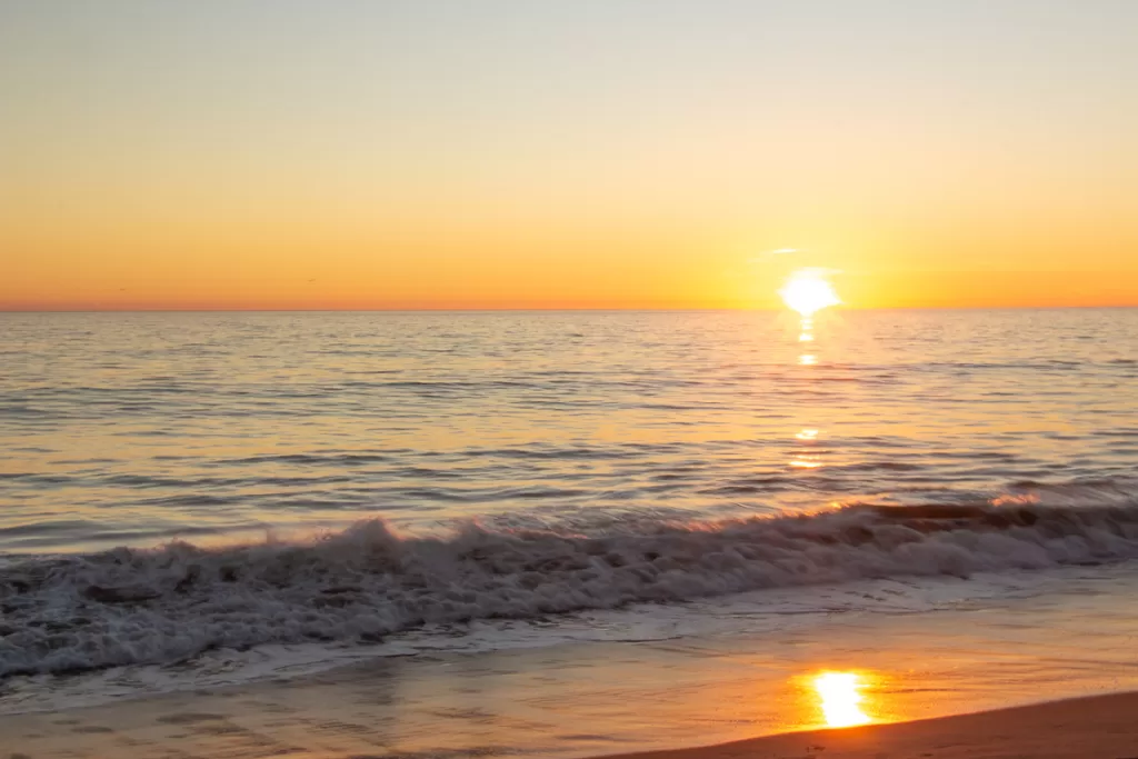 the sunset over the pacific ocean.